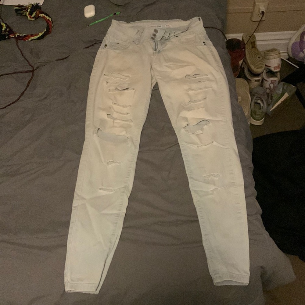 Light blue ripped jeans